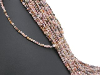 Pierced, colourful pink opal beads