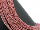 Pierced, pink rhodonite beads