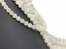 Perles blanches percées en pierre de lune