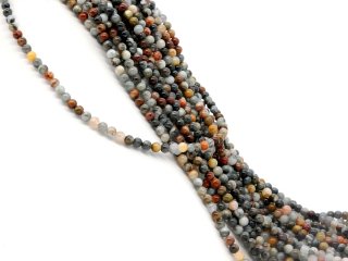 Pierced gemstone beads made from colourful eagle’s eye