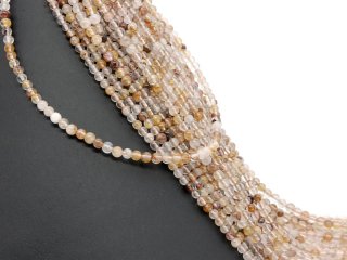 Pierced, small rutile quartz beads