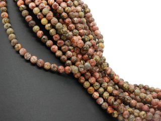 Pierced, patterned jasper beads