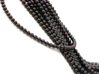 Pierced, dark red garnet beads