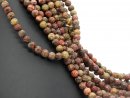 Perles de jaspe percées à motifs