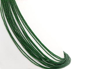 Glittering, pierced gemstone beads in green