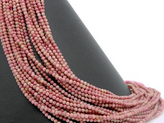 Pierced, pink rhodonite beads