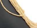 A strand of yellow cultured pearls