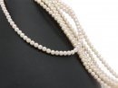Round, white Akoya pearls with hole
