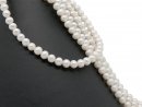 Oval white cultured pearls