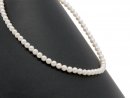 Round white cultured pearls, small size