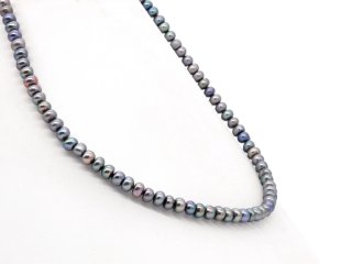 Button-shaped, small, purple-grey cultured pearls