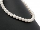 Pierced, loose, baroque cultured pearls in white
