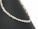 Pierced, shimmering biwa pearl discs in white