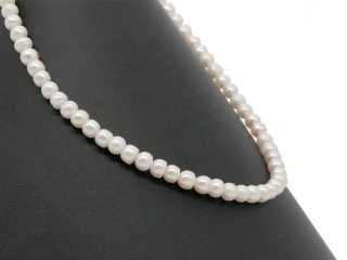 Baroque, white, loose cultured pearls with button-shaped hole