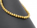 A strand of pearls made from gold-coloured cultured pearls