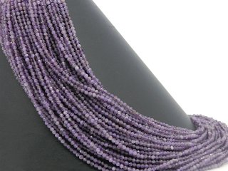 Faceted, pierced amethyst beads