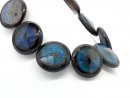 Patterned, pierced, large agate discs in shades of blue