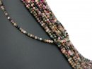 Faceted, pierced, dark tourmaline beads