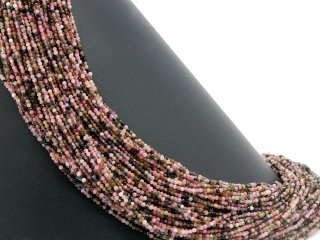 Faceted, pierced, dark tourmaline beads