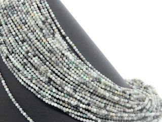 Small, faceted, pierced emerald beads