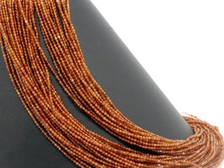 Perles de grenat orange facettées et percées
