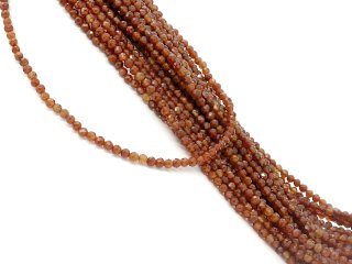 Perles de grenat orange facettées et percées
