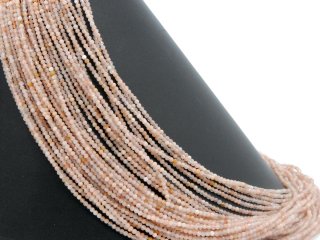Faceted, pierced, pink-coloured moonstones