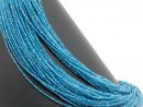 Sparkling blue, pierced apatite beads