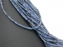 Blue speckled, pierced, faceted agate rondelle
