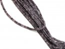 Purple-coloured, pierced, faceted agate rondelle