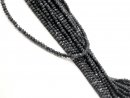 Dark grey, pierced, faceted agate rondelle
