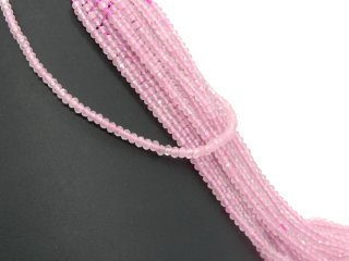 pink-coloured, pierced, faceted agate rondelle