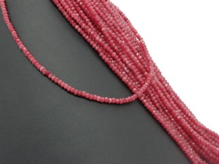 red-coloured, pierced, faceted agate rondelle