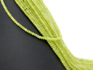 Green, pierced, faceted agate rondelle