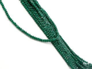 Grüne, durchbohrte, facettierte Achatrondelle