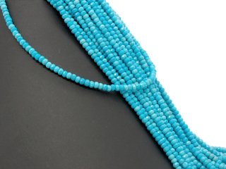 Sky-blue, pierced Howlith rondelle with facets