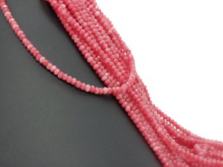 red-coloured, pierced, faceted agate rondelle