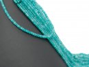 teal-coloured, pierced, faceted agate rondelle