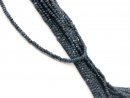 Dunkelgraue und dunkeblaue, durchbohrte, facettierte...
