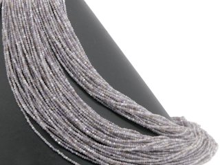 Facettierte, durchbohrte Amethystkugeln in Grau und Lila