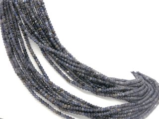 Faceted, purple, pierced iolite rondelle