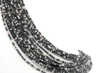 Pierced, grey-white jasper rondelle with facets