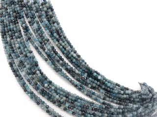 Pierced, blue tourmaline beads with facets