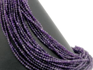 Boules daméthyste facettées et percées