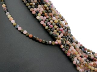 Faceted, coloured, pierced tourmaline beads
