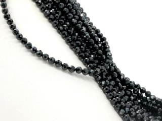 Black, pierced, faceted spinel beads