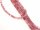 Pierced, faceted quartz beads in pink