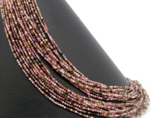 Faceted, coloured, pierced tourmaline beads