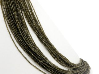 Faceted, small, pierced obsidian beads in green