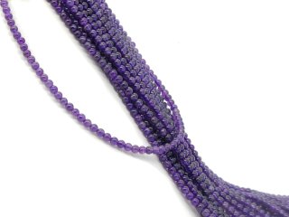 Small, pierced amethyst beads